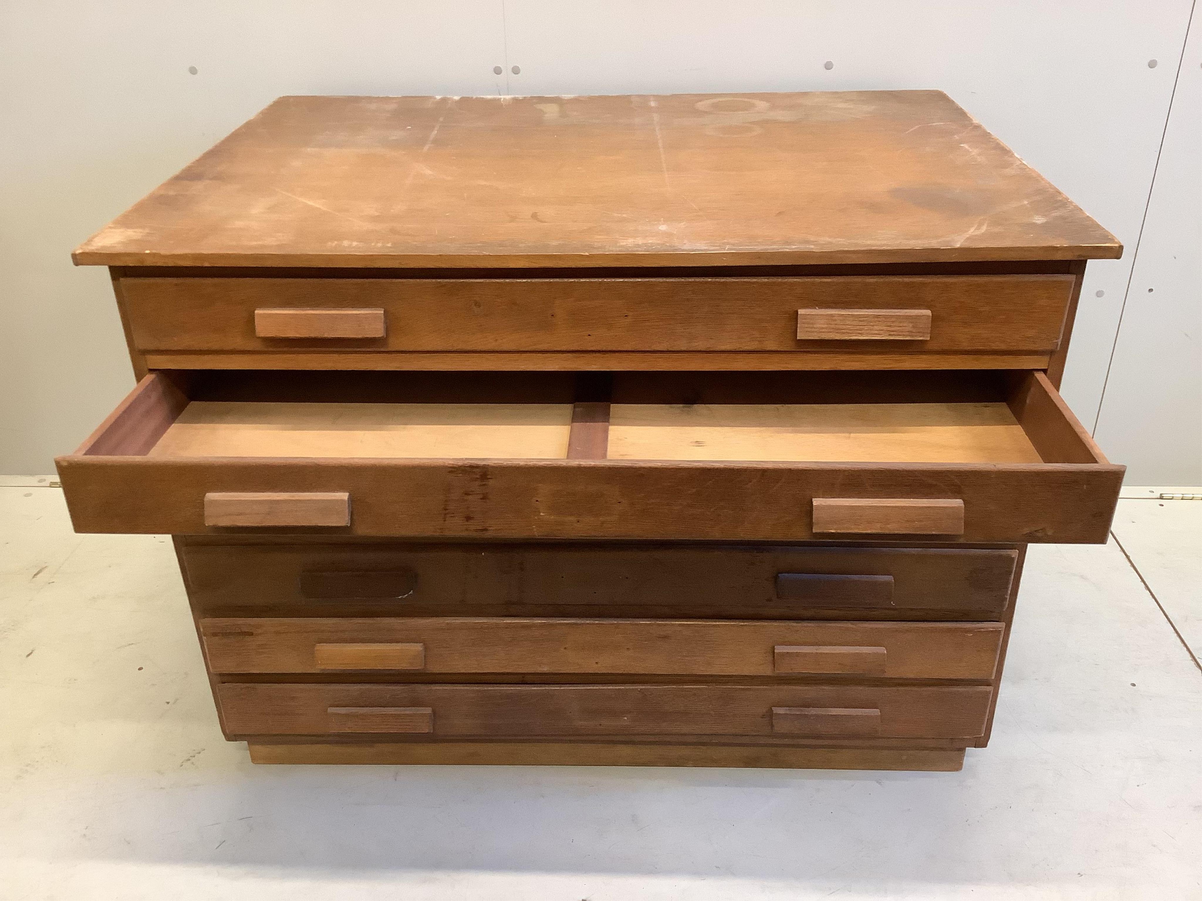 A mid century oak plan chest, width 120cm, depth 88cm, height 86cm